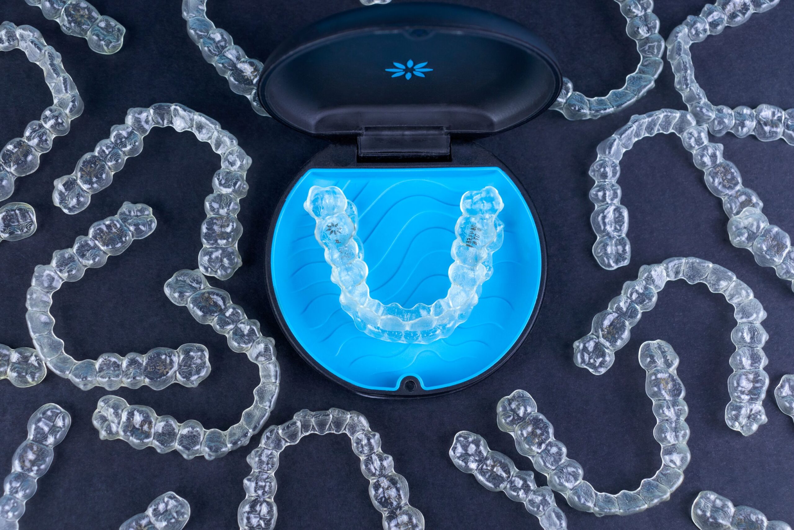 Invisalign on case surrounded by other aligners