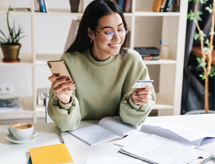 Woman holding a credit card