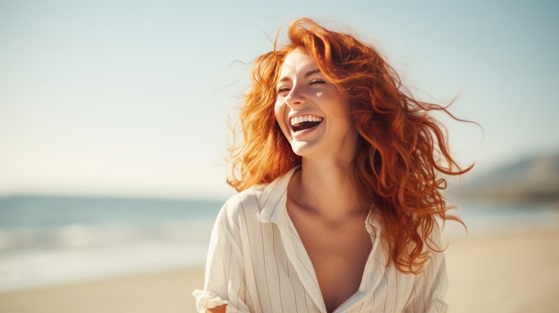 woman smiling on the beach